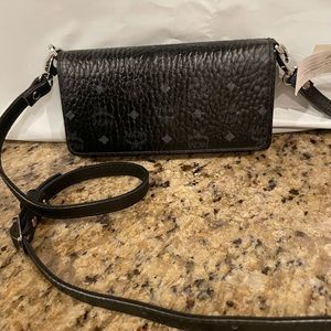 MCM Klara Monogram large tri- fold crossbody phone wallet “leather strap”
